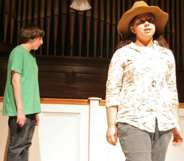 Sydney and Eugene performing Dan's play